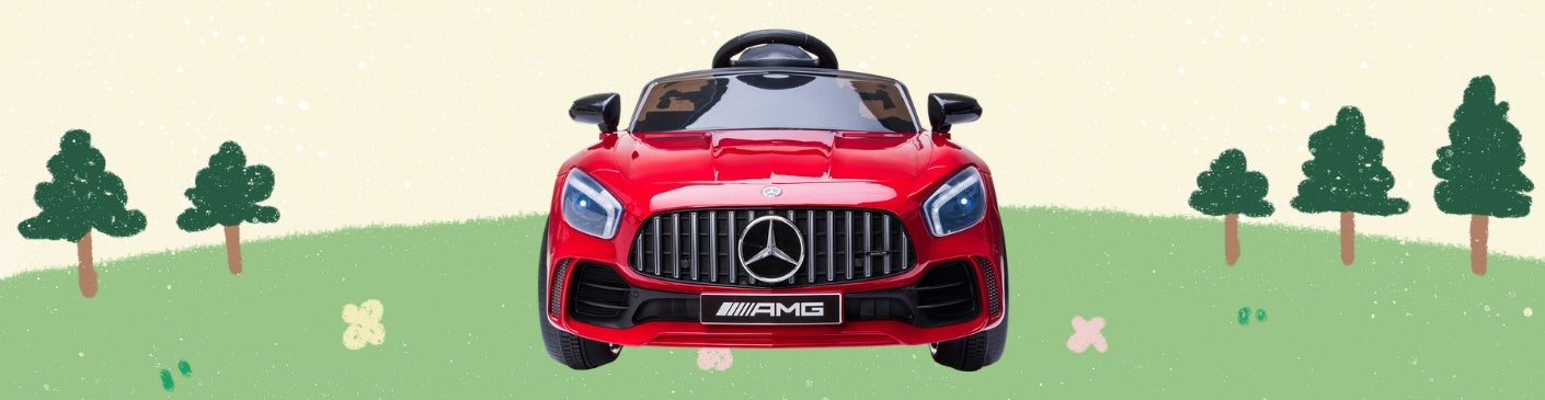 A red Mercedes-Benz AMG children's ride-on toy car centered against a stylized illustrated background with green trees, grass, and a cream sky.